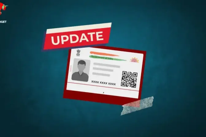 Aadhar card on a blue background representing the blog about updating Aadhaar details for free till December 14, 2023