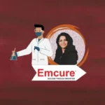 Namita Thapar and a male scientist in lab coats representing the success of Emcure Pharmaceuticals, with the Emcure Pharmaceuticals logo in the background.